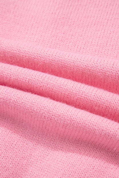 Rosa niedliche strickjacke mit blumenmuster und knopfleiste