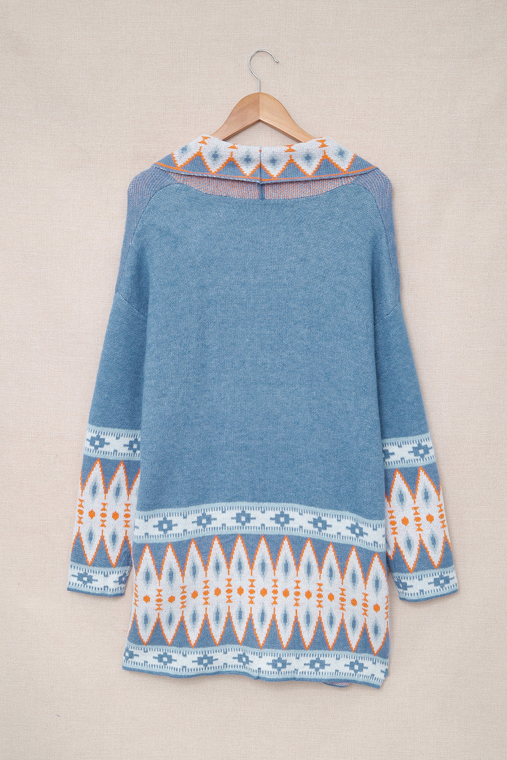 Blauw vest met een Azteekse patroon en open voorkant