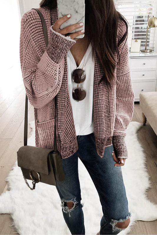 Roze vest met wafel gebreide en oversized kraag