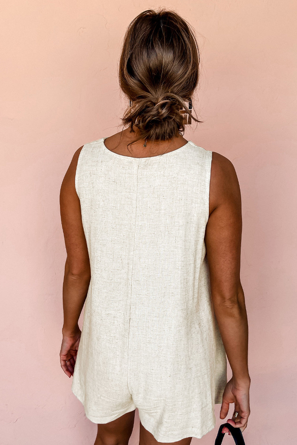 Beige mouwloze v-neck knop