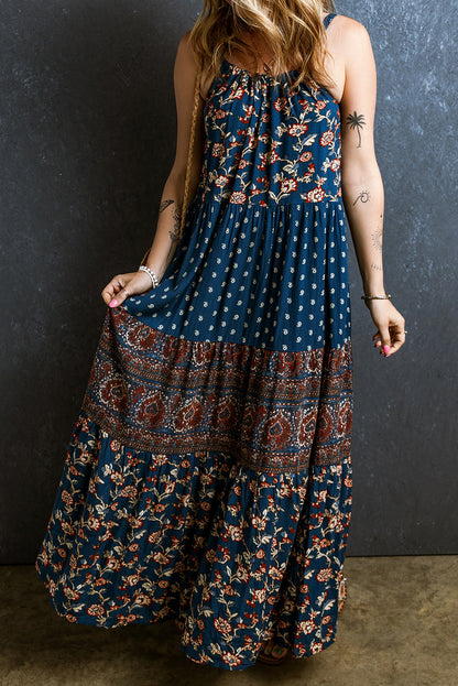 Blauwe mouwloze maxi-jurk in boho-stijl met bloemendecoratie