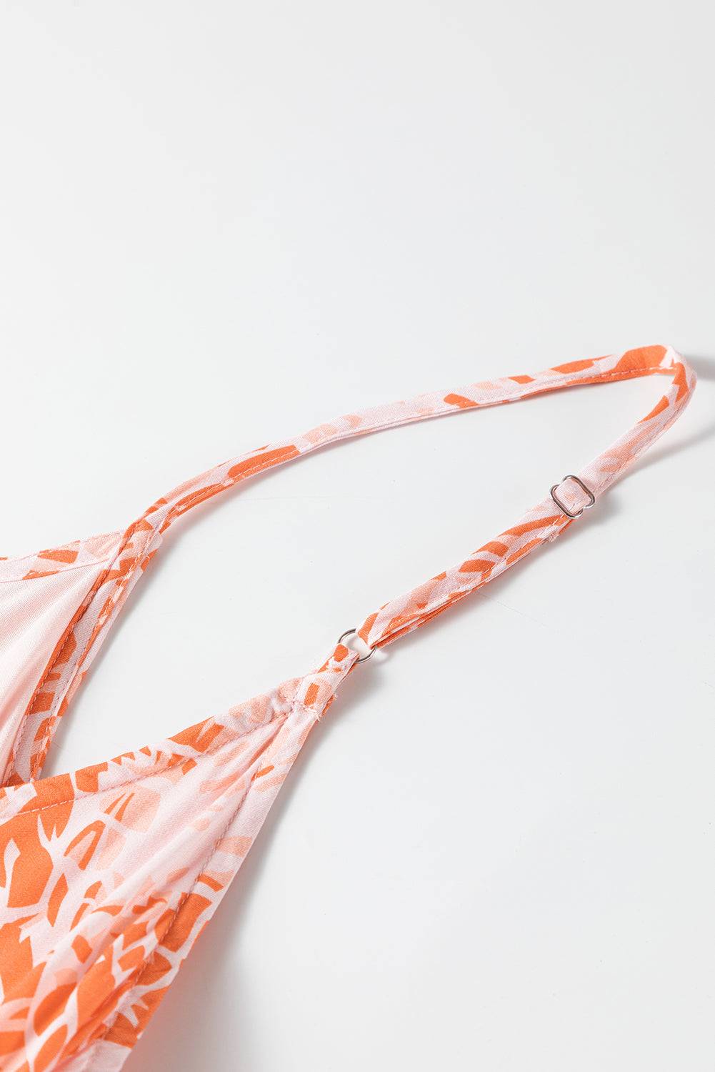 Abstract oranje spaghetti-riem maxi-jurk met rugvrije riemen