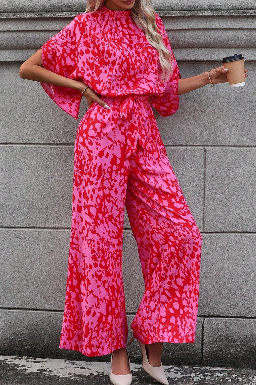 Roze luipaard losse mouwgordel met een wide been jumpsuit