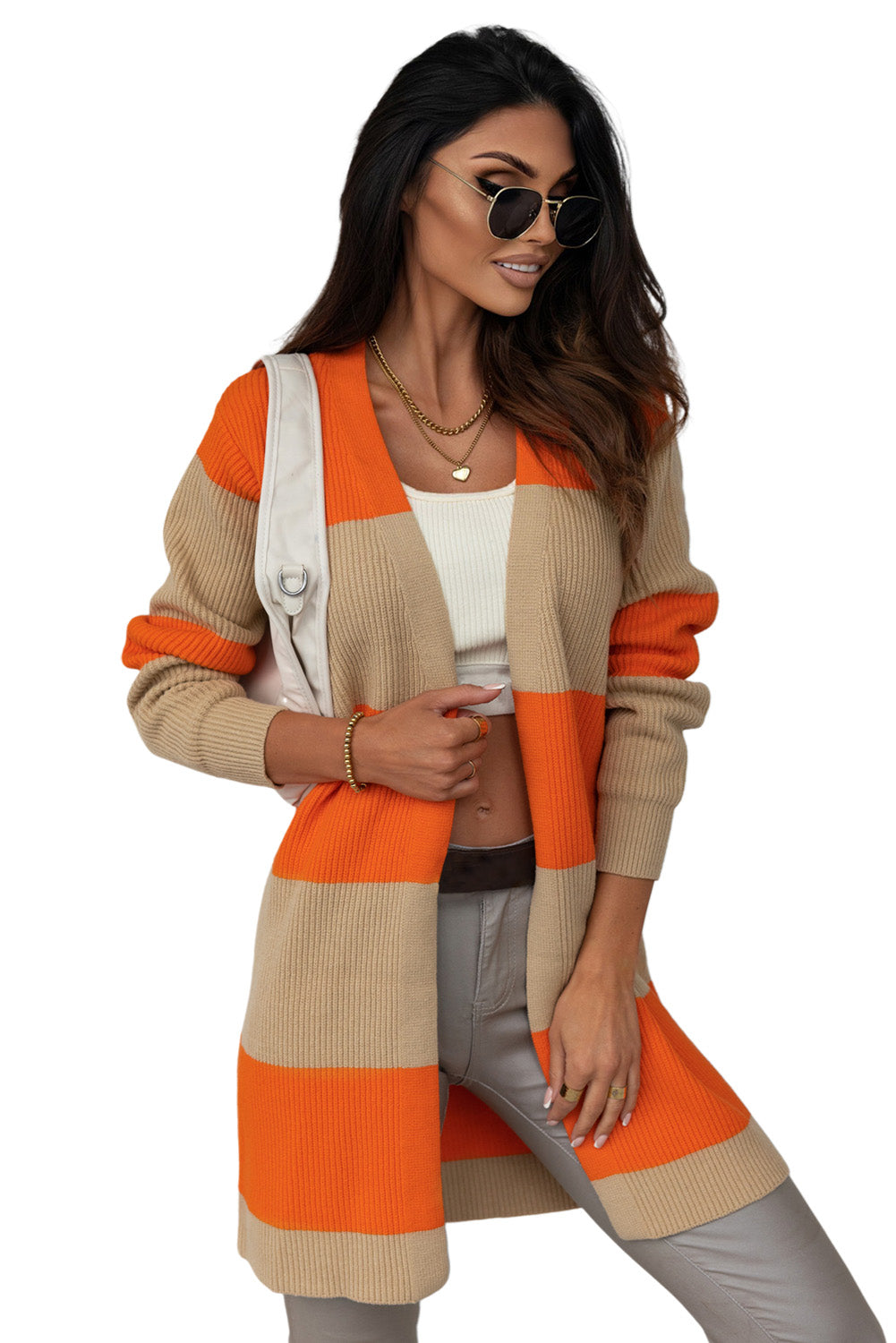 Orangefarbene colorblock-strickjacke mit rippstrick