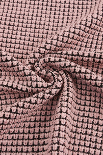 Rosa karierter strickcardigan mit offener vorderseite